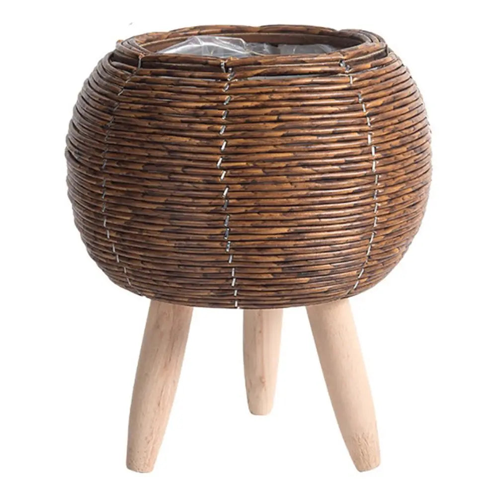 Natural woven planter on violet background