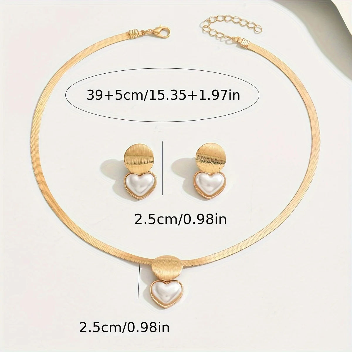 Elegant women’s gold jewelry set with a minimalist necklace and coordinated earrings.