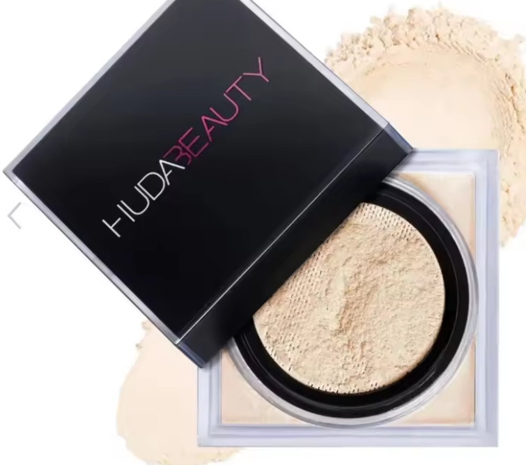 HUDA BEAUTY powder compact with open lid showing light beige powder.