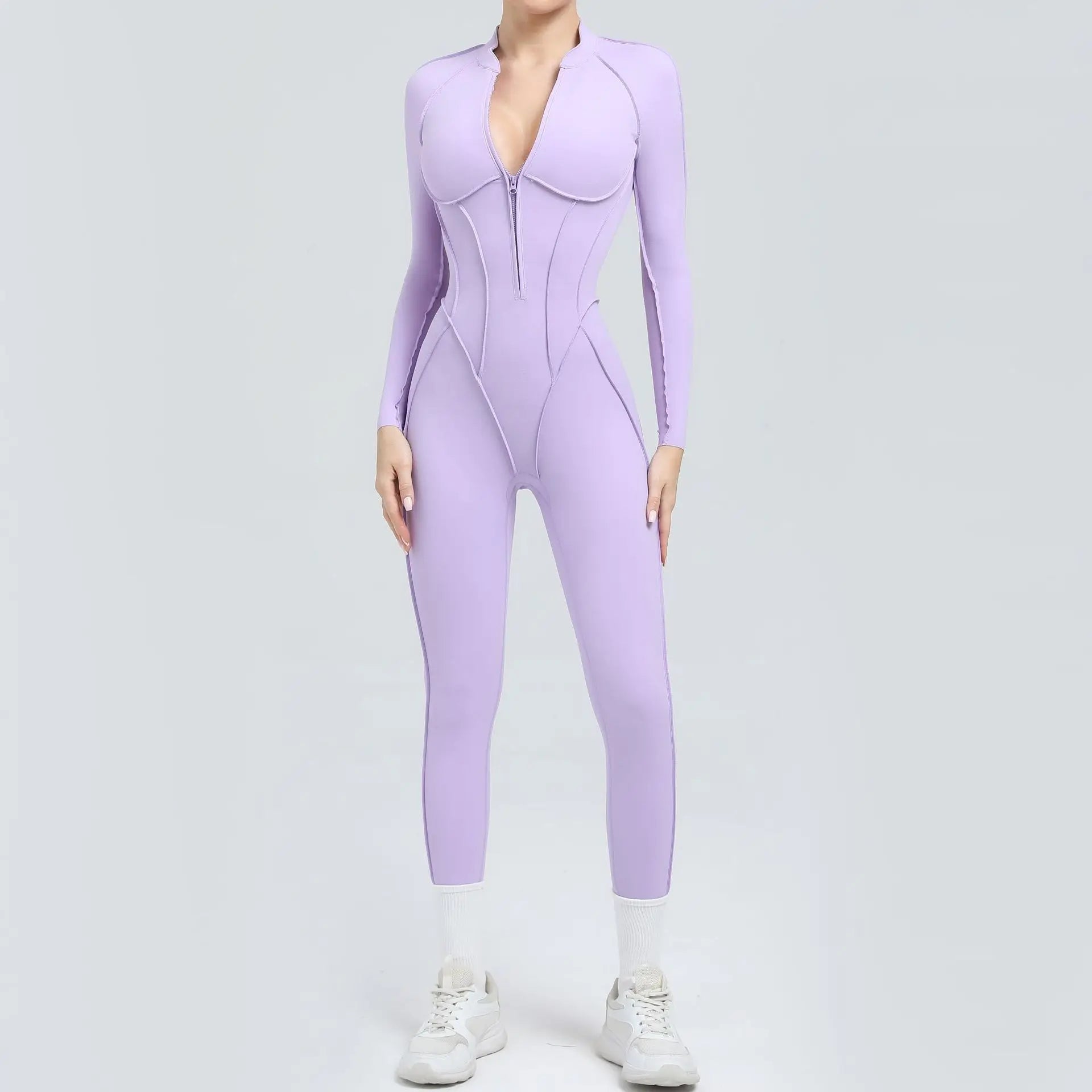 Lavender jumpsuit worn by a person on a light gray background