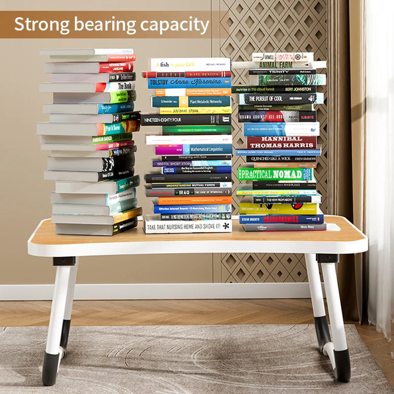 USB-powered desk lamp on a foldable laptop desk with a dedicated tablet slot.