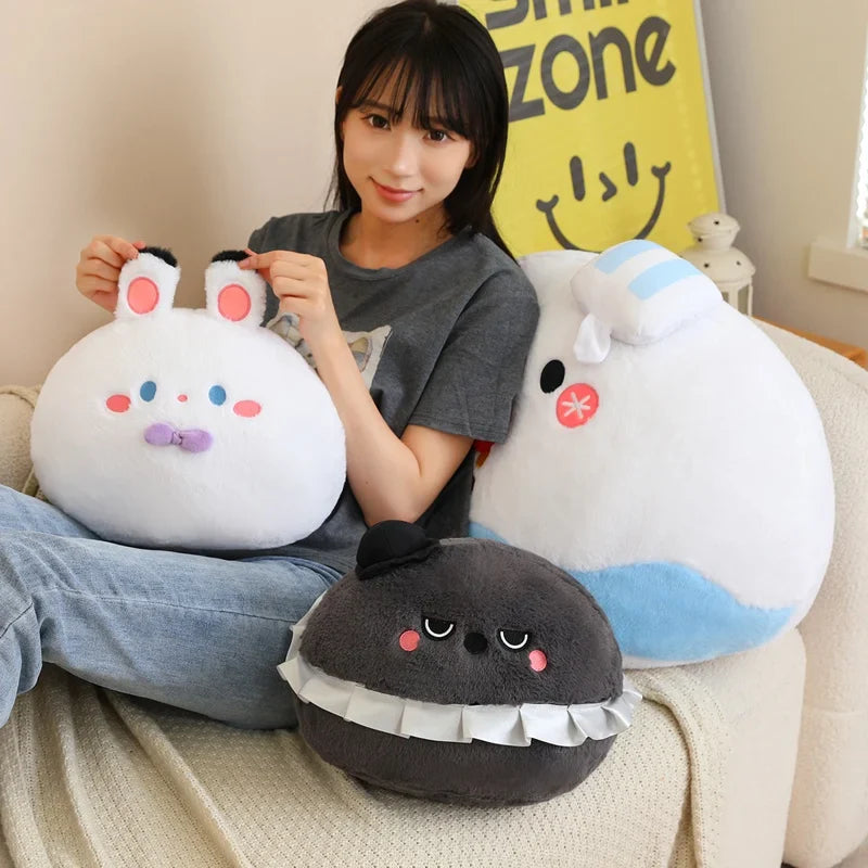 Person holding two plush toys resembling cartoon characters on a couch.