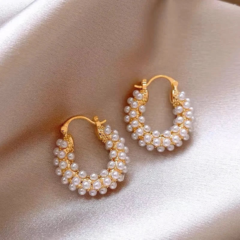 Timeless round pearl hoop earrings, perfect for weddings, parties, and everyday elegance.