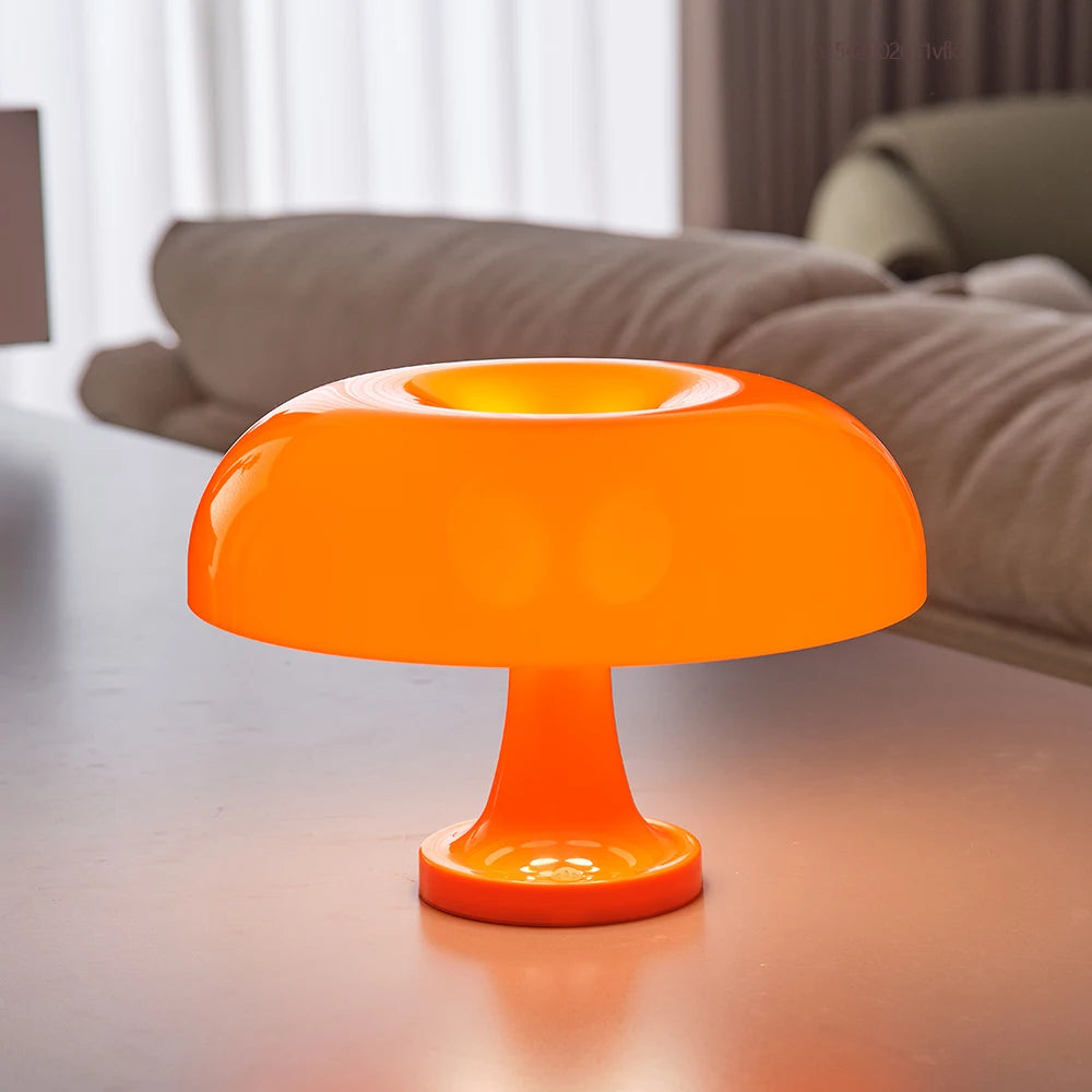 White mushroom Bauhaus table lamp on wooden nightstand