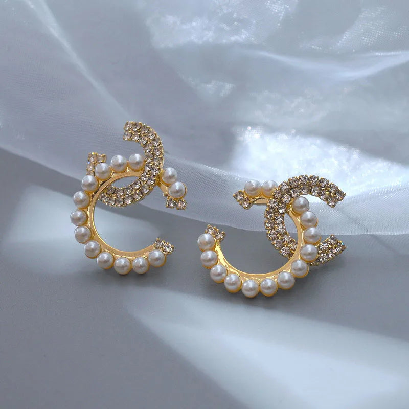 Timeless letter shaped earrings with elegant pearls and rhinestones, perfect for gifting.