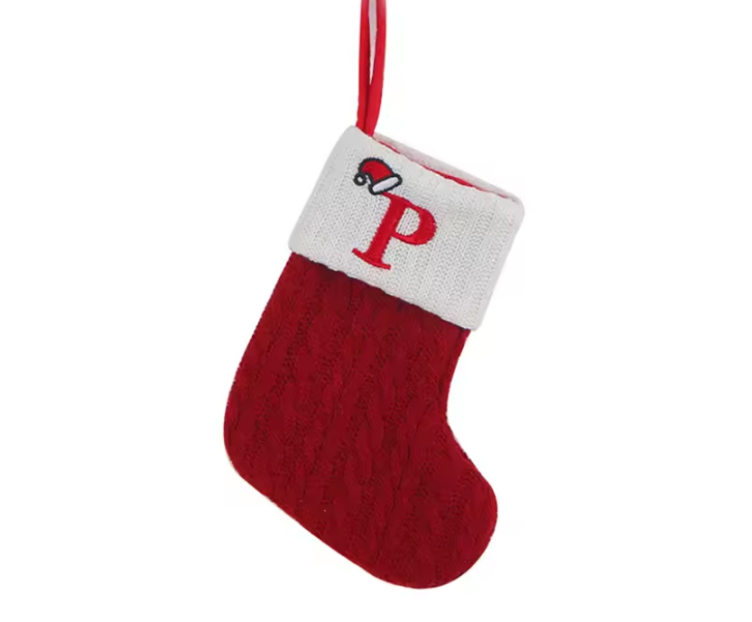Red Christmas stocking with white cuff featuring a red letter 'P' on a white background